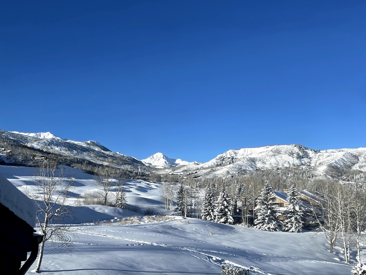 Snowy ski slope and mountain view from Snowmass condo